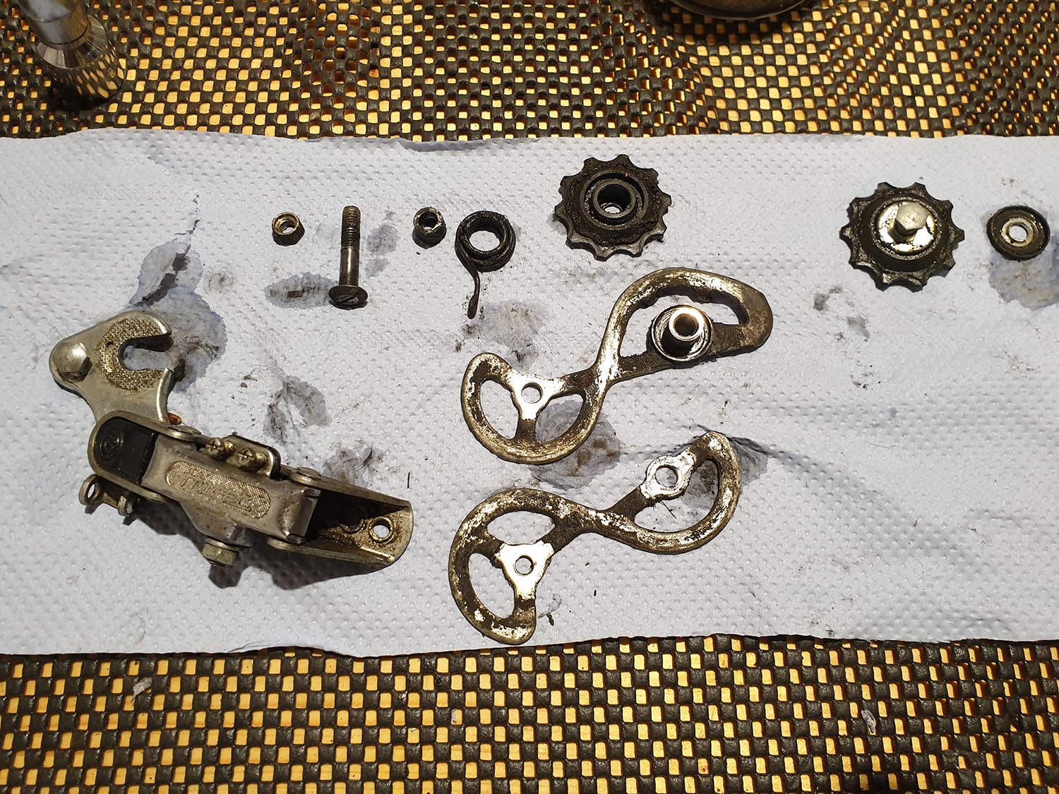 The rear Derailleur gear mechanism was heavily greased and dirty. Needed to be stripped, serviced and adjusted from Woodbridge.